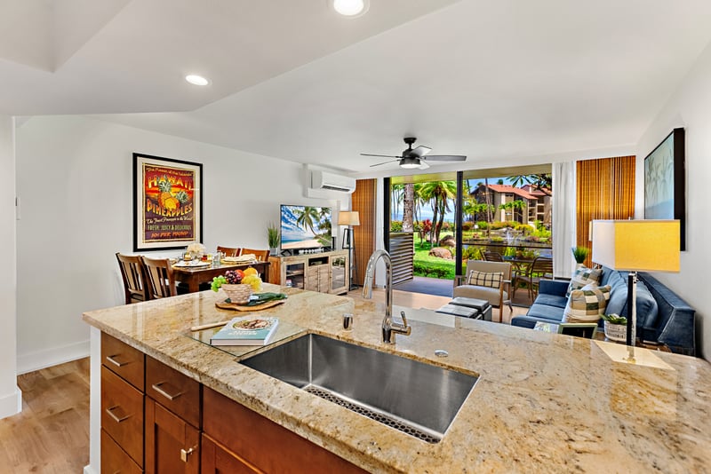 Your kitchen’s breakfast bar offers additional seating, ideal for quick bites before morning walks along the oceanfront path. PKD-104