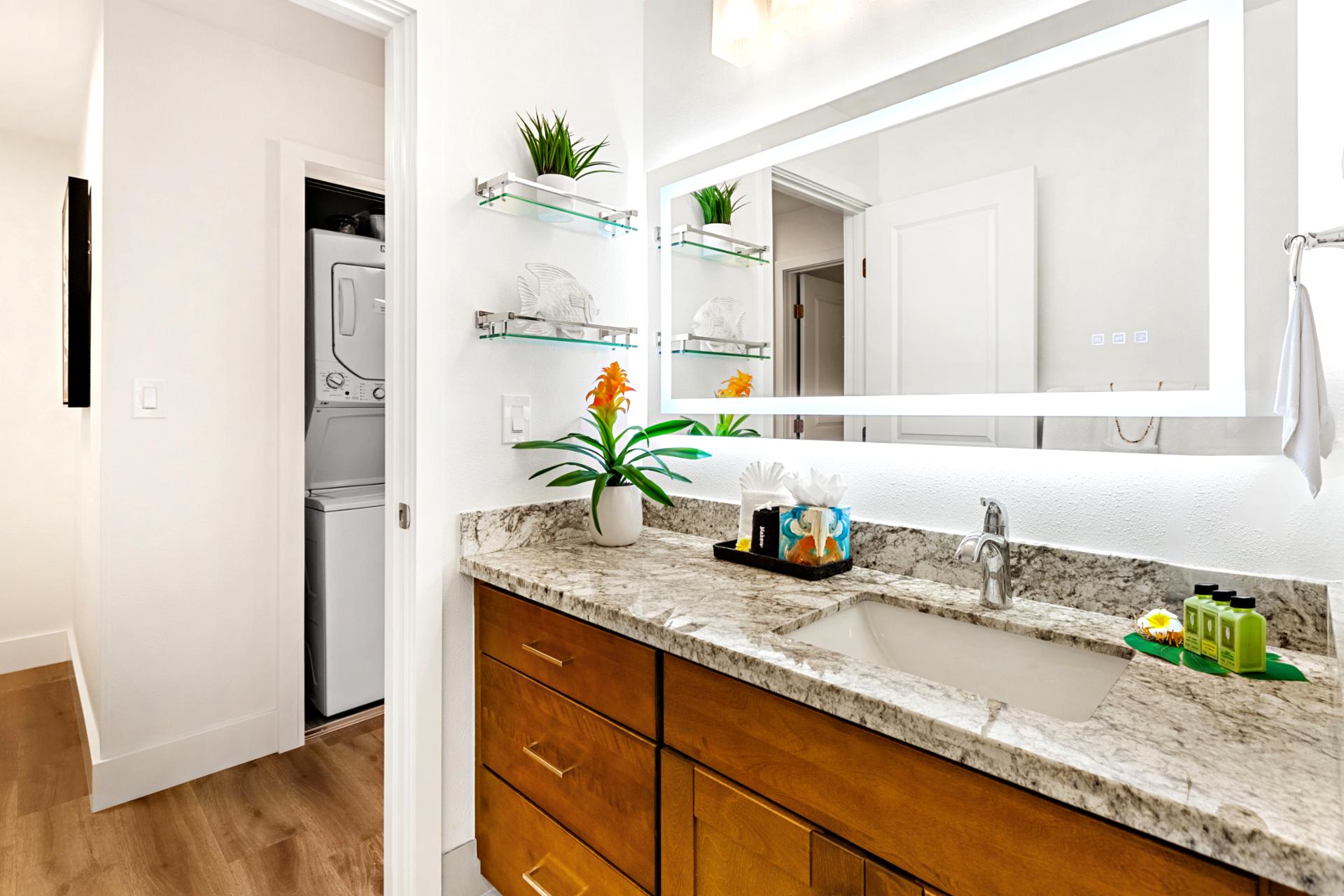 Your bathroom includes a granite countertop and spacious vanity, giving you room to spread out with ease.