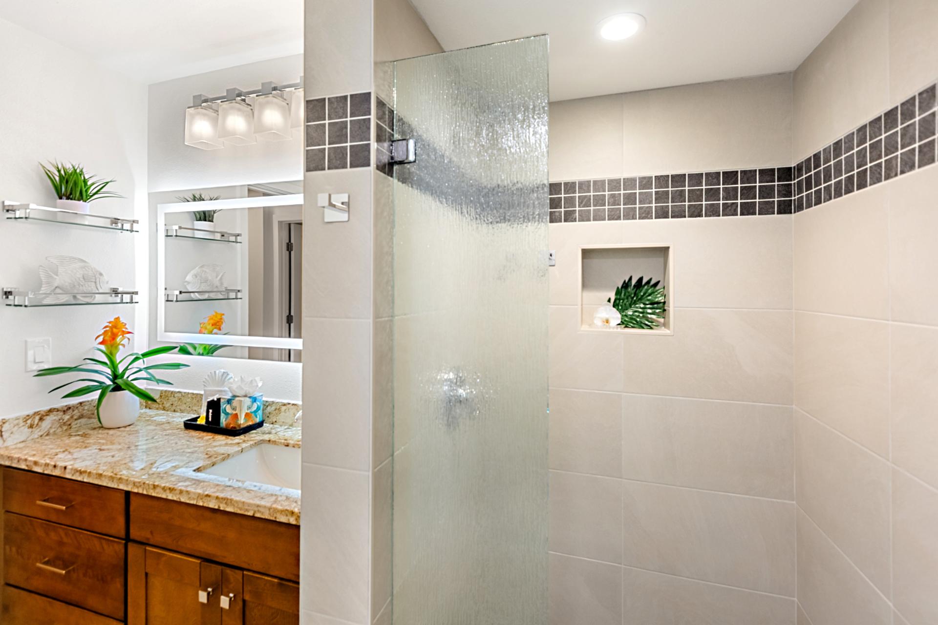 Step into your shower and tub combination, ideal for rinsing off after the beach or soaking at the end of the day.