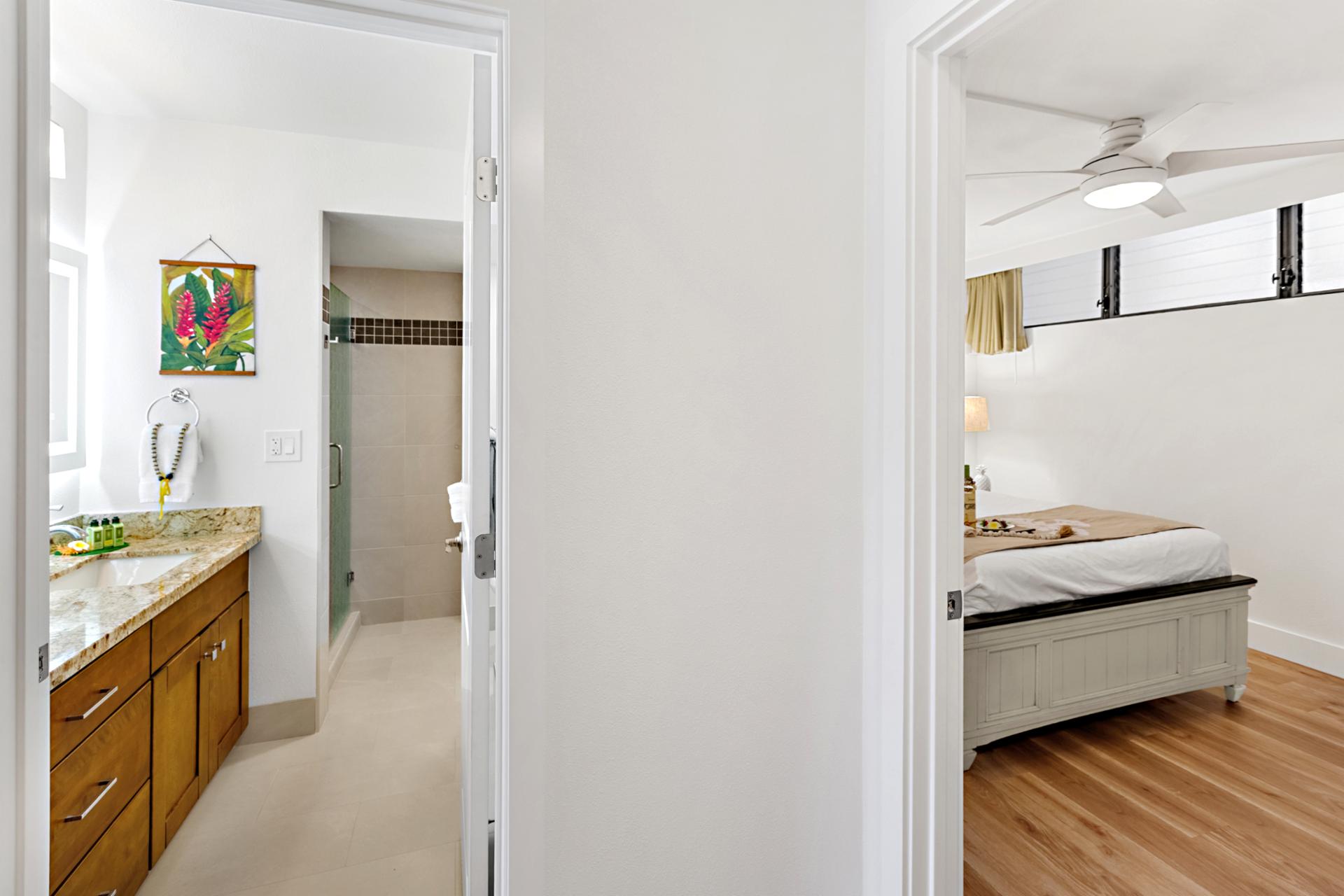 Hallway access leads you from bedroom to bath, creating a functional layout that keeps your space open and connected.
