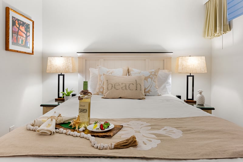 Neutral decor and plush bedding create a peaceful retreat where you can recharge between beach adventures. PKD-104