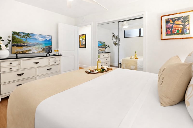 Your comfortable queen bed and soft lighting set the tone for slow mornings before stepping out to the lawn. PKD-104