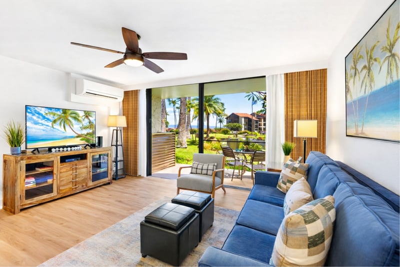 From your living room, sliding glass doors open to tropical views, filling your space with natural light and seamless indoor outdoor flow. PKD-104