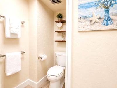 The bathroom offers a well lit, private area to get ready or unwind