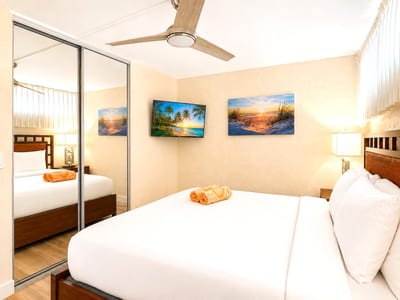 The serene primary bedroom offers a peaceful retreat in the heart of Papakea Resort