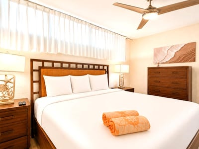 Designed for comfort and relaxation, the bedroom provides a tranquil setting to recharge after your island adventures