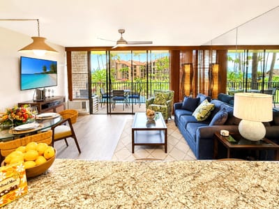 The living room offers comfortable seating and a relaxing retreat after exploring Maui's world-famous beaches and attractions