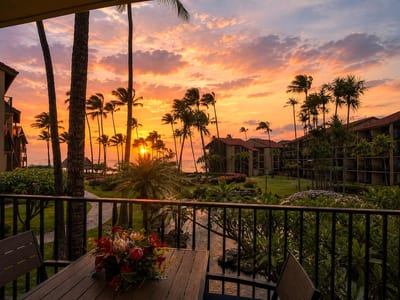 Experience Maui's legendary sunsets from your private lanai, where swaying palms and the Pacific Ocean create an unforgettable evening backdrop