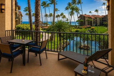 Enjoy morning coffee or sunset cocktails from your private lanai overlooking Papakea's lush tropical grounds PKD-204