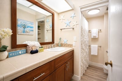 The bathroom offers a bright, functional space to prepare for beach days, sunset dinners, and everything in between PKD-204
