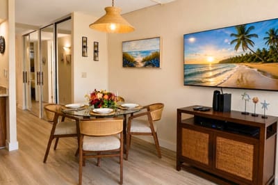 Beachy elegance meets modern comfort. We’ve designed this open-concept dining and living space with natural cane textures, warm wood tones, and subtle coastal touches so you can relax in style. PKD-204
