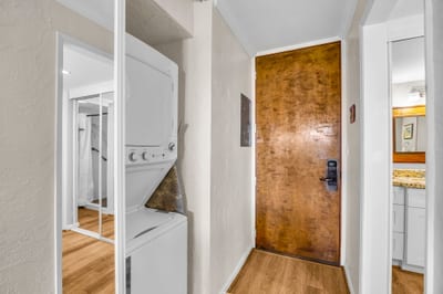 An in-unit stacked washer and dryer adds everyday convenience to your island stay