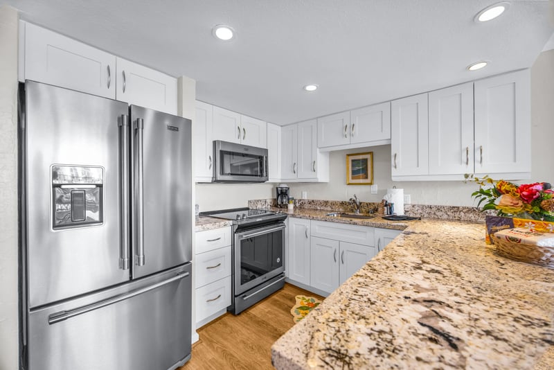 The bright kitchen features updated appliances