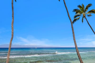Beautiful Pacific Ocean views stretch from the lanai with neighboring islands on the horizon