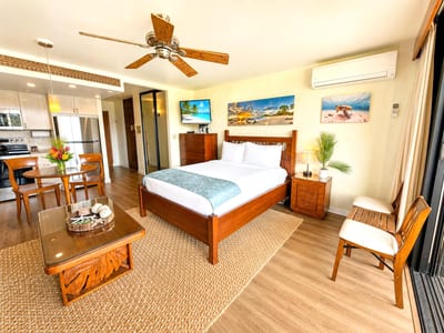 The suite features real wood furniture with gentle island accents
