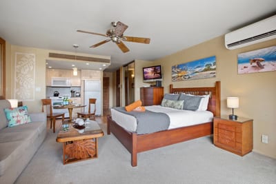 Tropical texture meets modern ease—this guest suite is where ocean dreams and comfort come to stay