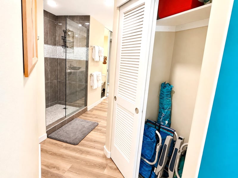 Beach supplies can be found in the primary bedroom closet