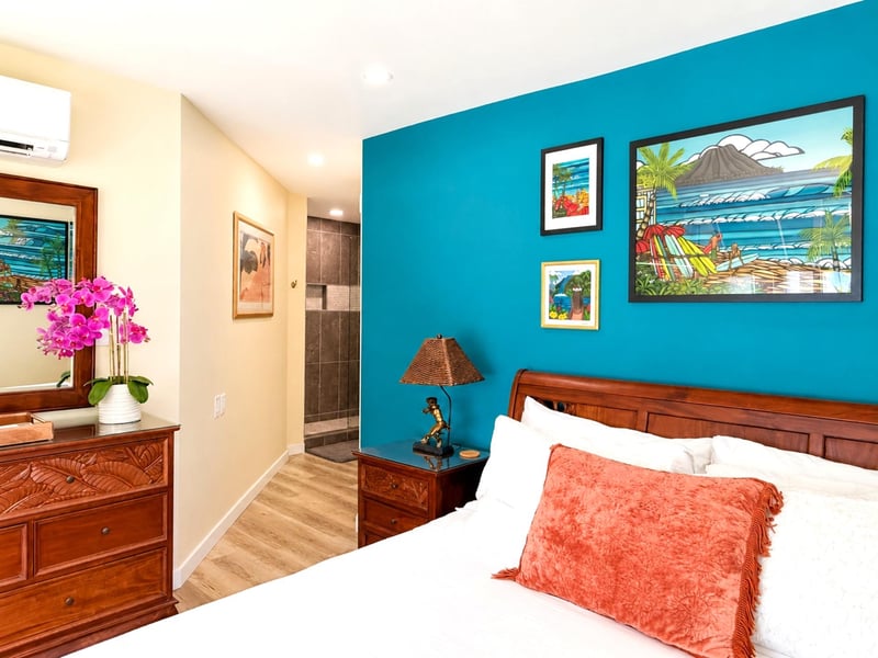 Relax in a spacious primary bedroom designed for comfort and tranquility