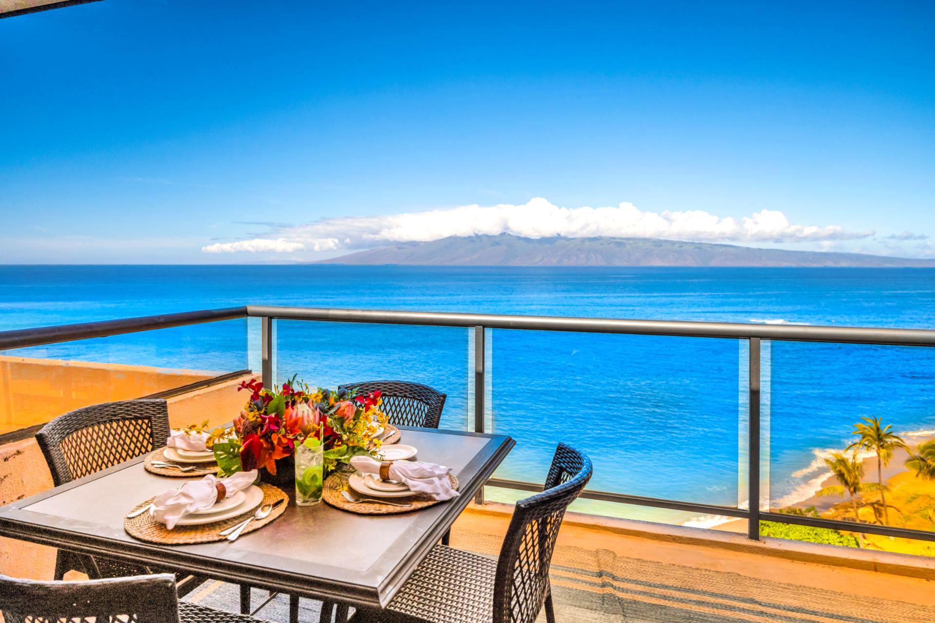 Oceanfront perfection awaits from this elevated lanai with panoramic views of the water.