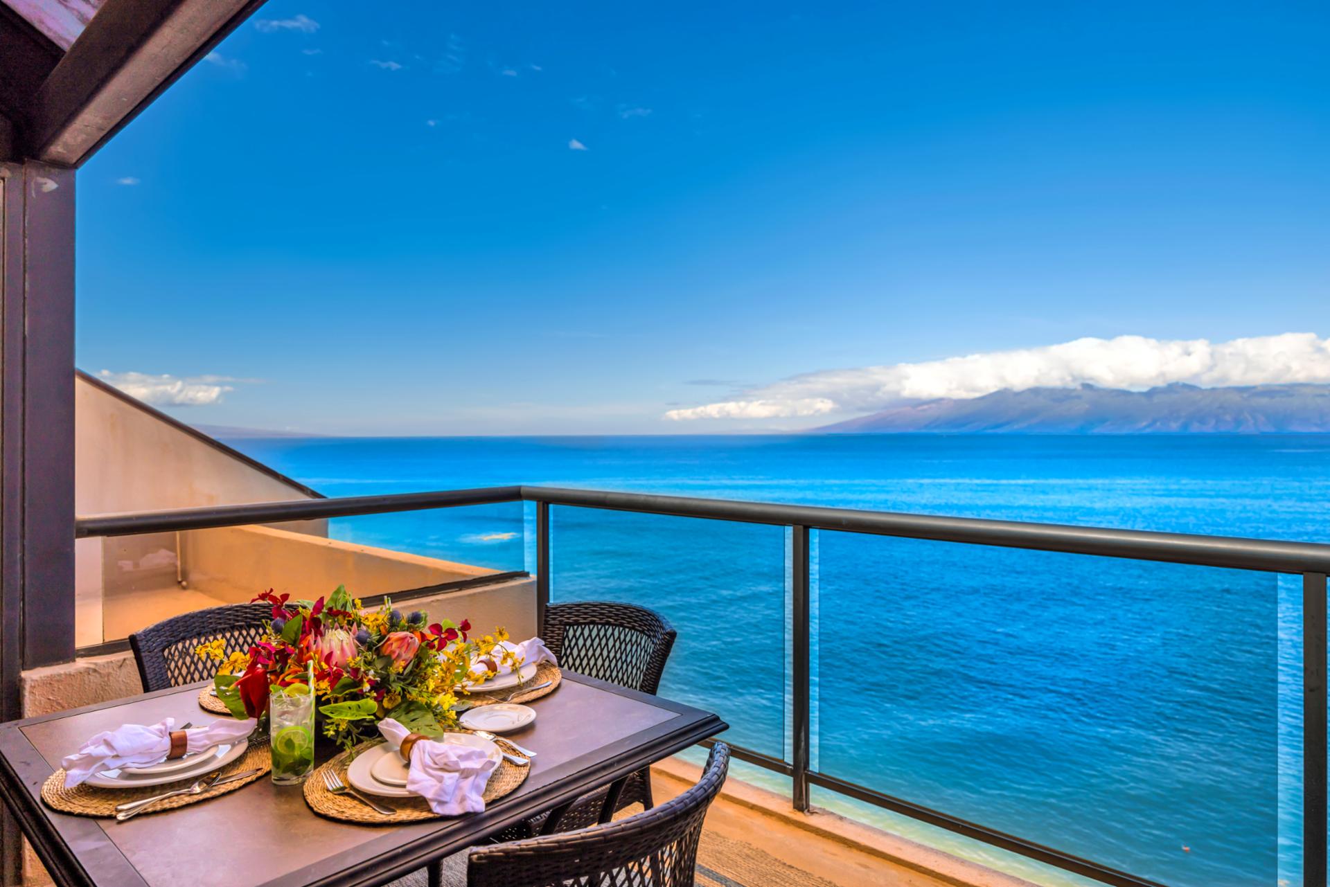 From sunrise to sunset, soak in this panoramic ocean view from your private lanai above the sand.