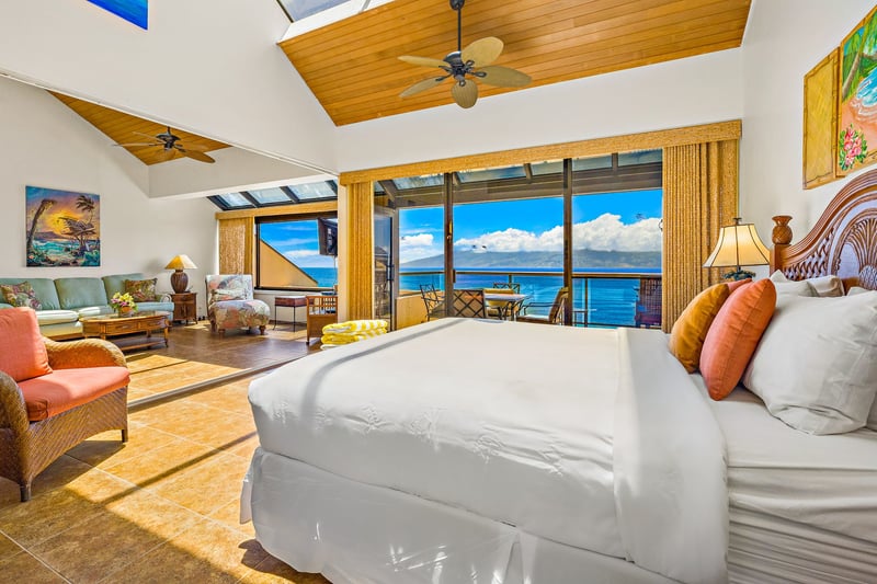 Wake in sunlit serenity as warm island tones and lofty ceilings invite the day’s first golden glow