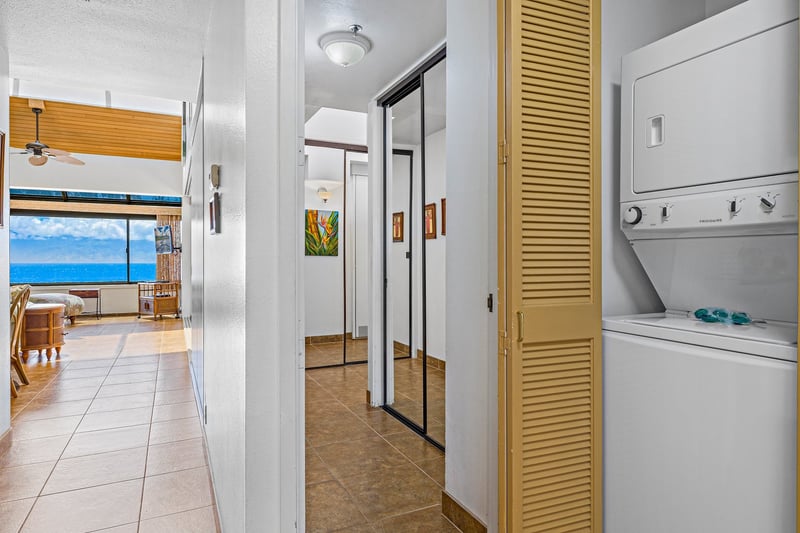 Keep beachwear and vacation outfits clean and ready to wear thanks to the private laundry setup in the closet