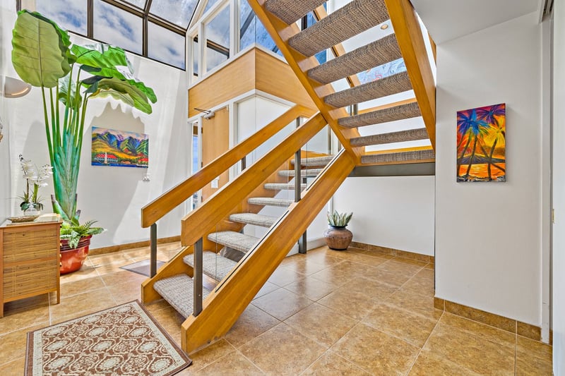Let the natural light and playful pops of color turn every trip upstairs into a mini tropical adventure