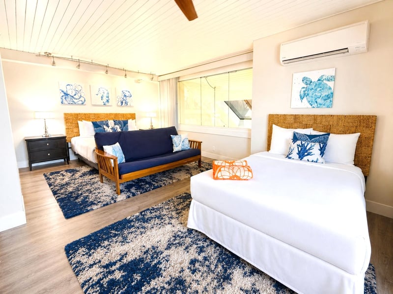 The second guest bedroom features a king and queen bed, perfect for additional guests