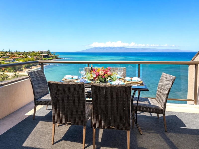 The lanai offers front-row seats to the blue water below