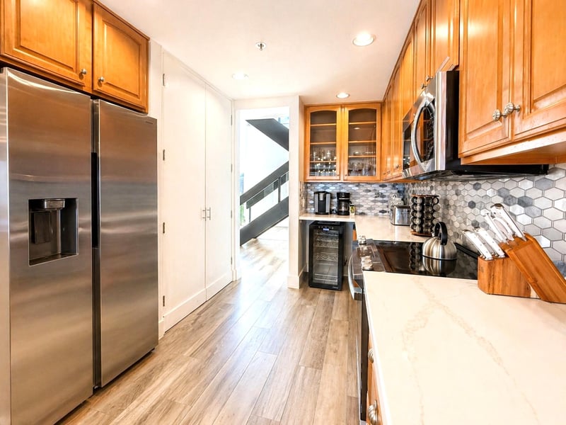 Clean cabinetry and modern finishes give the kitchen a polished, well-maintained feel throughout