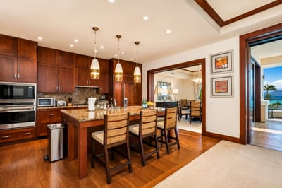 Fully equipped gourmet kitchen opens to the dining area for easy entertaining