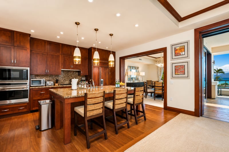 Fully equipped gourmet kitchen opens to the dining area for easy entertaining MON-1303
