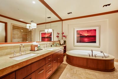 Indulge in spa-like luxury with a deep soaking tub and marble finishes