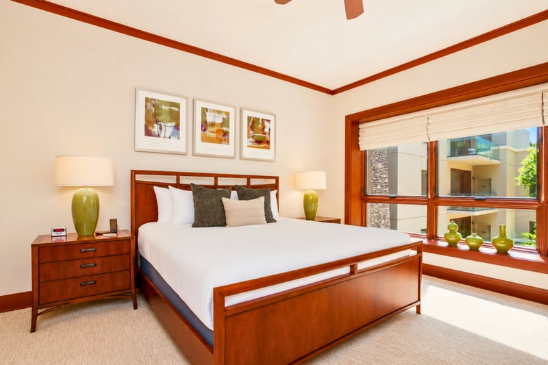Comfortable and clean, this guest bedroom offers restful nights and morning light MON-1303