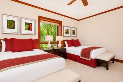 This queen bed guest suite is bright, cheerful, and perfect for family stays