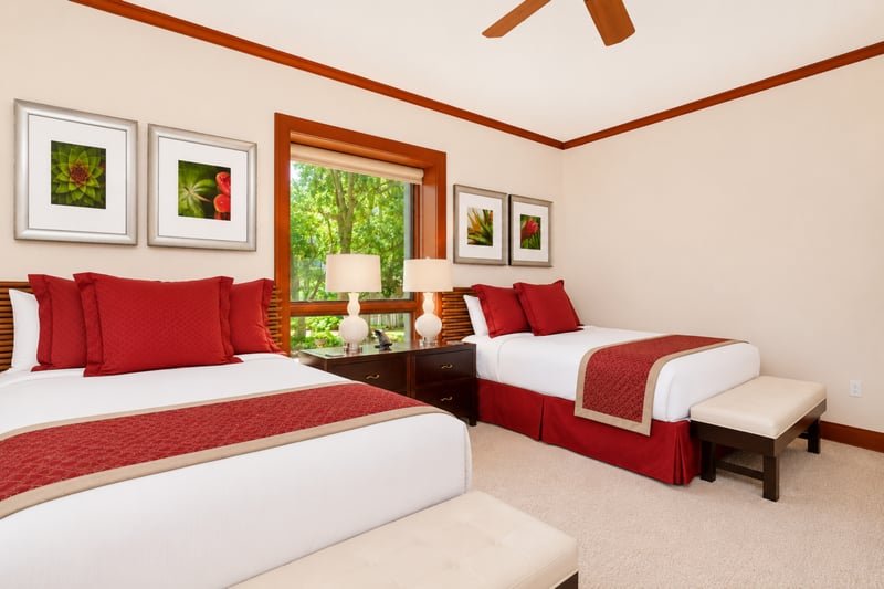 This queen bed guest suite is bright, cheerful, and perfect for family stays
