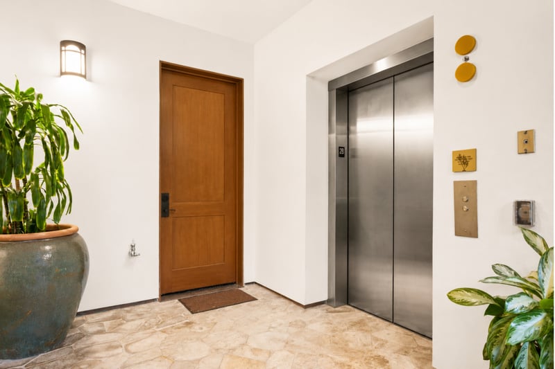 Elevator entry at The Resort at Kapalua Bay MON-2206 — direct access to floor 2B from the building's tiled lobby MON-2206