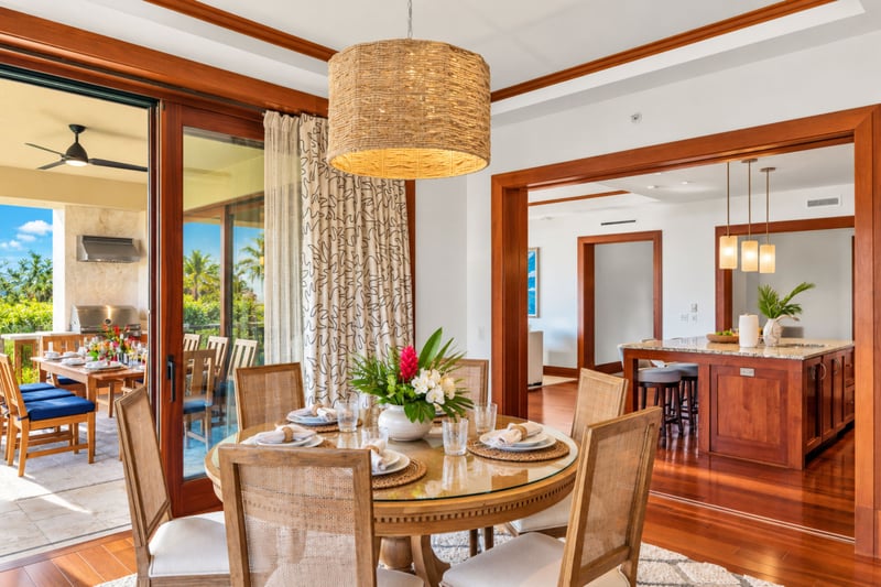 Formal dining room set for six with direct access to the lanai and kitchen