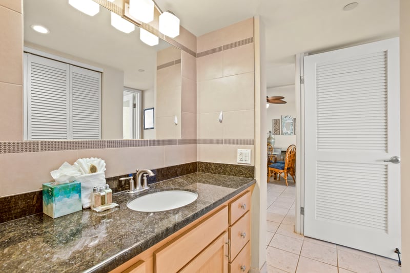 With its pristine finishes and serene design, this guest bathroom offers both style and comfort for visiting guests
