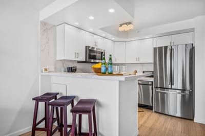The kitchen features ample counter space and modern appliances for longer stays VIR-107