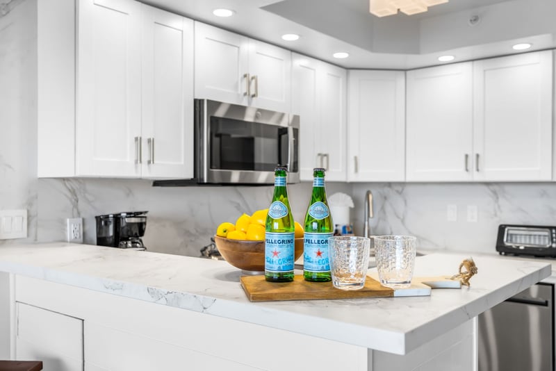 The recently updated white cabinets and stainless appliances give the kitchen a clean, well-appointed feel