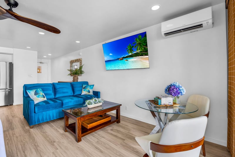 Bright and open, the living space offers plenty of room to spread out after a day on the beach