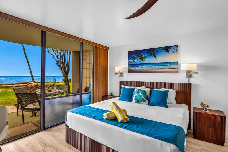 The king size bed features luxurious hotel grade linens for ultimate comfort