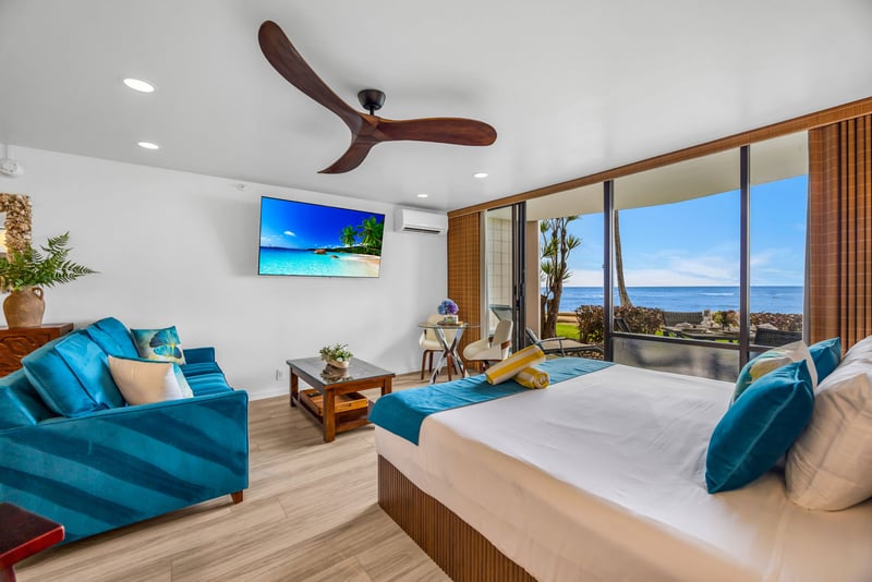 The recently updated suite offers a king bed, flat-screen TV, and a ceiling fan to keep the trade winds moving
