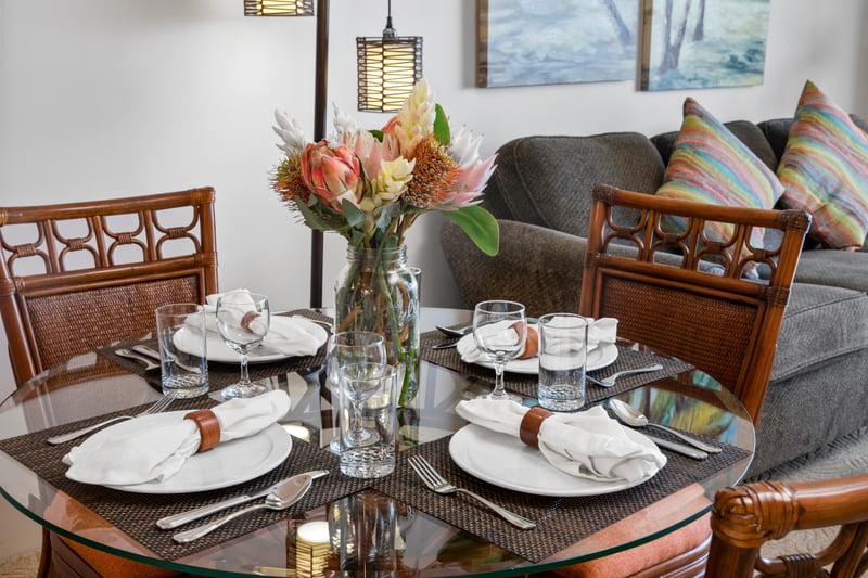 Dine in style with rich wood textures, soft neutral tones, and a floral centerpiece that adds an organic island touch WH1-1211