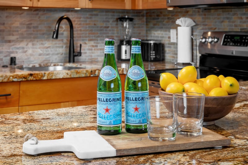 A sparkling welcome awaits, enjoy Pellegrino, fresh lemons, and island luxury right from the start WH1-1211