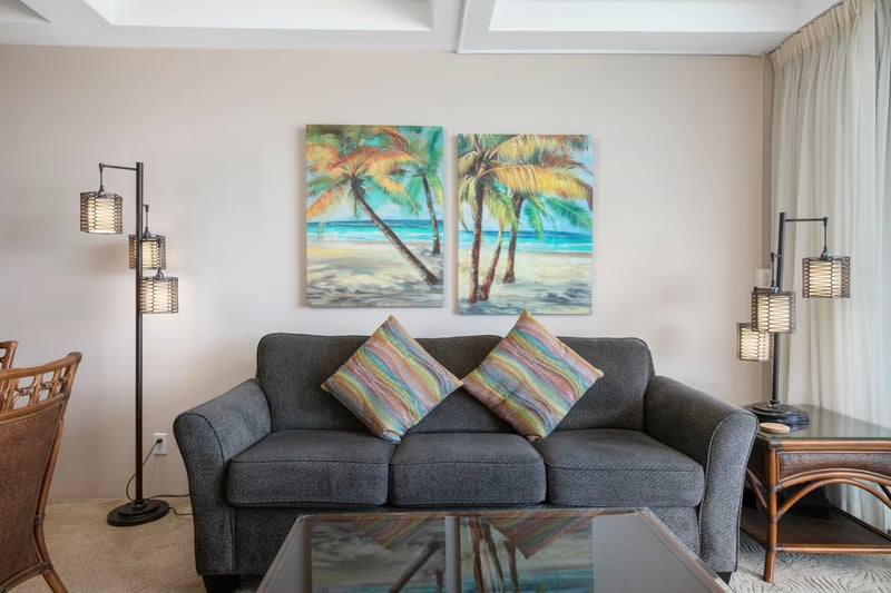 Bright pillows, rattan charm, and a front-row seat to the ocean’s sparkle—this space is island magic come alive    WH1-1211