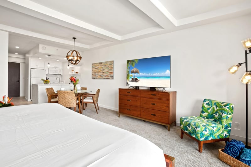 Soft sunlight pours into this airy suite, where organic textures and open skies invite you to linger
