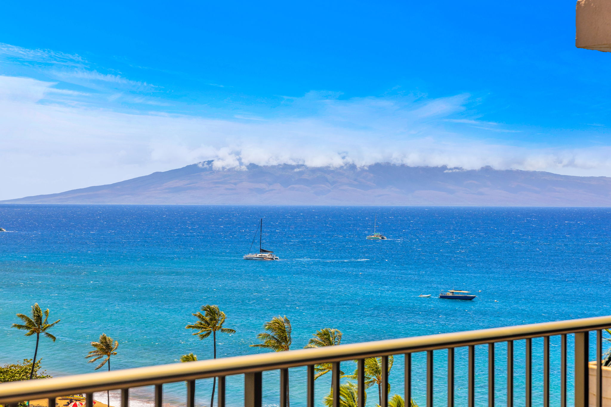 Wake up to turquoise waters and island breezes right outside your lanai.