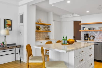 Fully equipped kitchen blending modern design with island comfort.